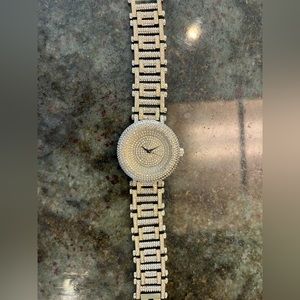 Men’s 18k gold watch